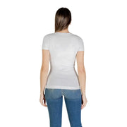 Woman wearing Guess White Paillettes Round Neck T Shirt with blue jeans for spring summer fashion