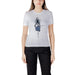 Woman wearing white organic cotton short sleeve round neck T shirt with fashion illustration