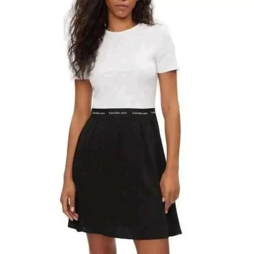Woman in white t-shirt, black Calvin Klein skirt – Calvin Klein Jeans Women Dress
