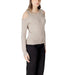 Woman wearing beige cold-shoulder sweater from Women Cold Shoulder Sweater Collection