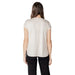 Woman wearing beige T shirt and black pants from Womens Beige T Shirt and Black Pants collection