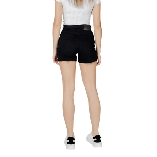 Women’s black denim shorts displayed in a product image with stylish and casual appeal