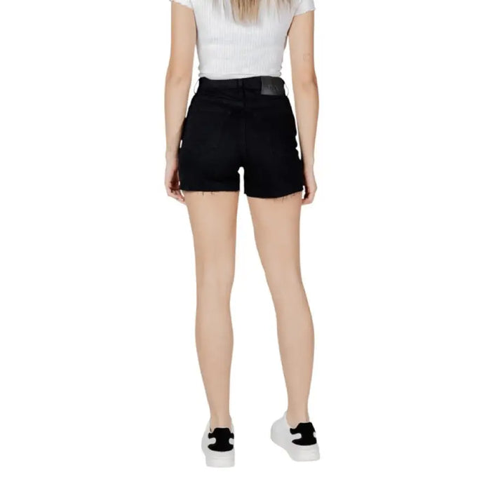 Women’s black denim shorts displayed in a product image with stylish and casual appeal