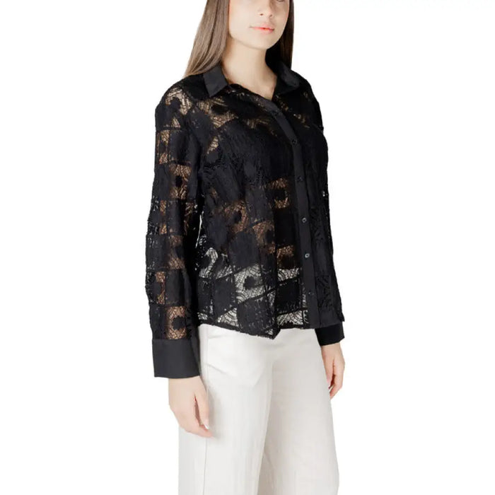 Woman wearing a black lace button-down shirt from Womens Black Lace Button Down Shirt collection