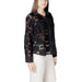 Woman wearing a black lace button-down shirt from Womens Black Lace Button Down Shirt collection