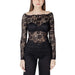 Woman wearing a black lace long-sleeve top displayed in the Women’s White Lace Long Sleeve Top product image