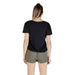 Woman wearing a black puff-sleeve V neck top and green shorts for casual style