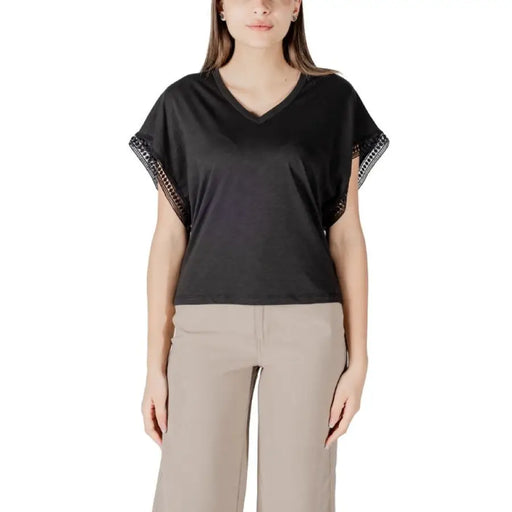 Womens black V neck top with lace sleeves, stylish and elegant fashion apparel