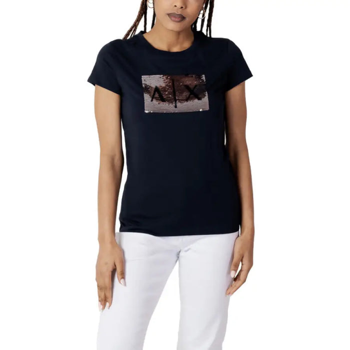 Woman wearing Armani Exchange Women’s Black Print T-Shirt with dark blue sequined logo
