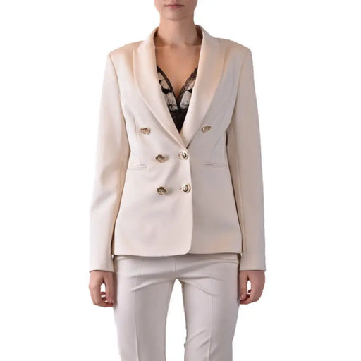 Elegant Women’s Double-Breasted Blazer and Pants Suit displayed on a model