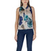 Woman’s Rinascimento floral print sleeveless green blouse paired with navy pants