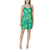 Woman wearing a green and blue patterned sundress by Green Blue Patterned Sundress