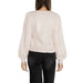 Woman wearing a light pink V neck sweater with balloon sleeves from Women V Neck Sweater collection