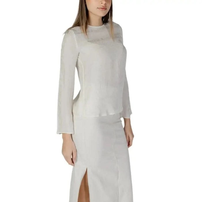 Armani Exchange women’s beige blouse and skirt set from the Spring Summer Collection