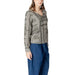 Woman wearing a stylish patterned long-sleeved blouse from Women’s Patterned Long Sleeve Blouse collection