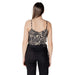 Woman wearing patterned camisole and black jeans in Womens Patterned Tie Front Tank Top
