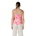 Woman’s pink and white patterned tank top from Floral Print Camisole and White Pants collection