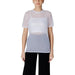 Woman wearing a sheer top with a white tank top underneath in the Women’s Sheer Top with White Tank product image