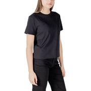 Woman wearing Jacqueline De Yong black cotton short-sleeve T-shirt with embellished V-neck