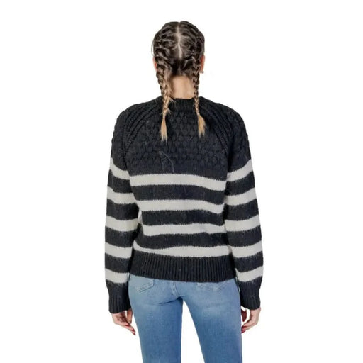 Black Striped Women’s Knit Sweater with Round Neck displayed on a model
