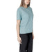 Woman wearing a teal T shirt and black pants, featured in the Women Light Blue T Shirt product image