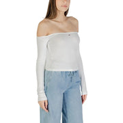 Woman wearing a white off-the-shoulder long-sleeved top from Womens White Off The Shoulder Long Sleeved Top collection