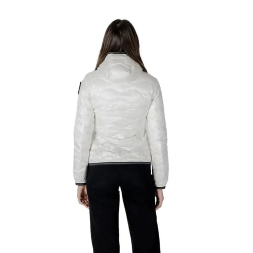 Woman’s Blauer white quilted turtleneck jacket featuring front pockets