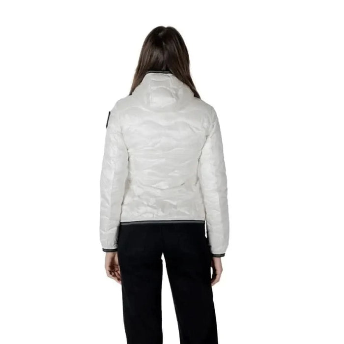 Woman’s Blauer white quilted turtleneck jacket featuring front pockets