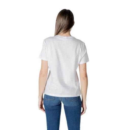 Woman wearing Liu Jo White Cotton Print Short Sleeve Round Neck T Shirt and blue jeans
