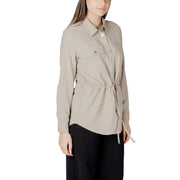 Womens beige button down blazer with long sleeves drawstring waist and two chest pockets in soft fabric