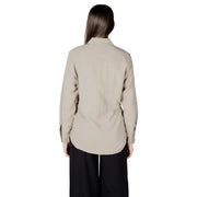 Womens beige button down drawstring blazer shown from the back with long sleeves classic collar and subtle pleats
