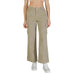 Women beige cotton elastane wide-leg cargo trousers paired with white platform sneakers