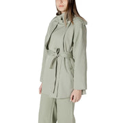 A sleek olive green women’s belted trench coat with structured shoulders perfect for formal or casual wear