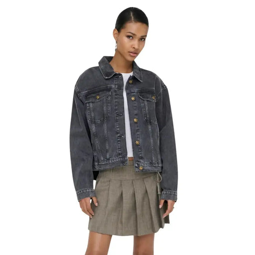 Women’s black cotton blazer featuring dark gray denim jacket style with gold-tone buttons and classic flap pockets
