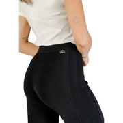 Women’s black ribbed knit leggings with gold-tone logo tag on waistband for Liu Jo Women Trousers