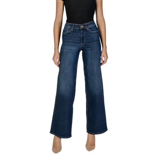 Dark wash wide-leg denim jeans from Womens Blue Jeans with Zip Button Closure and Pockets