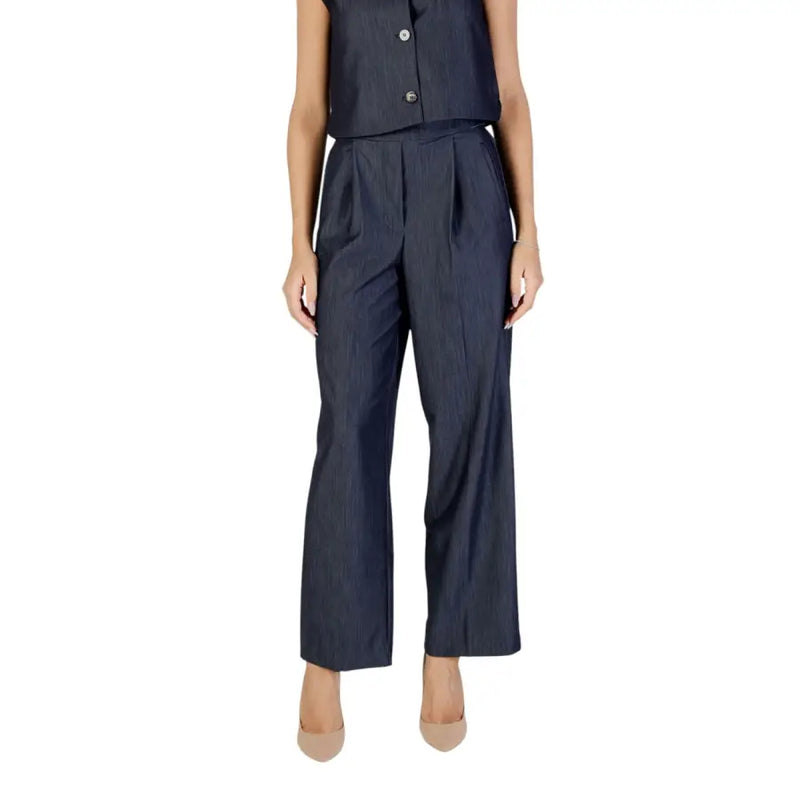 Women’s dark blue pinstripe wide-leg jumpsuit with sleeveless top and button details