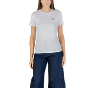 Women’s white cotton short-sleeve round neck T-shirt with blue text and dark blue wide-leg jeans