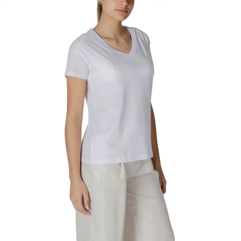 Womens white v neck t shirt made of soft cotton fabric featuring short sleeves and a comfortable fit