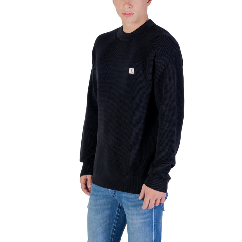 Calvin Klein Jeans Pull en coton tricoté noir
