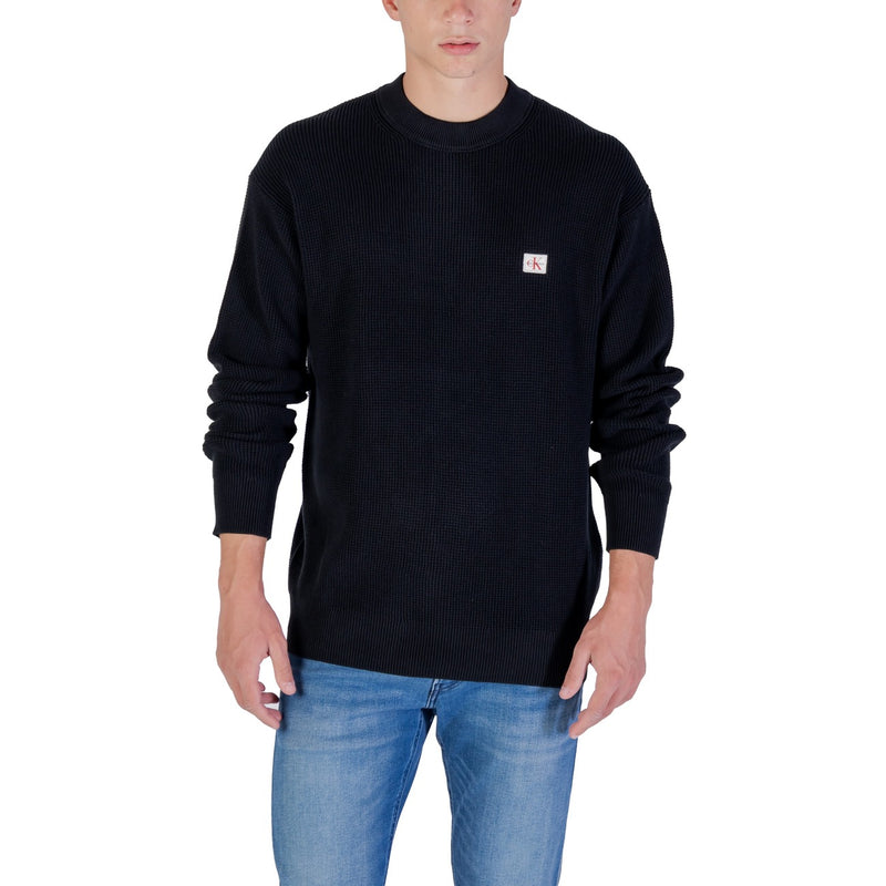 Calvin Klein Jeans Pull en coton tricoté noir