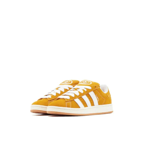 Yellow Adidas Campus sneakers displayed prominently in the product image