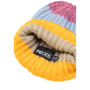 A cozy ribbed knit yellow striped women’s cap with bold pink light blue mustard and beige stripes for fall and winter