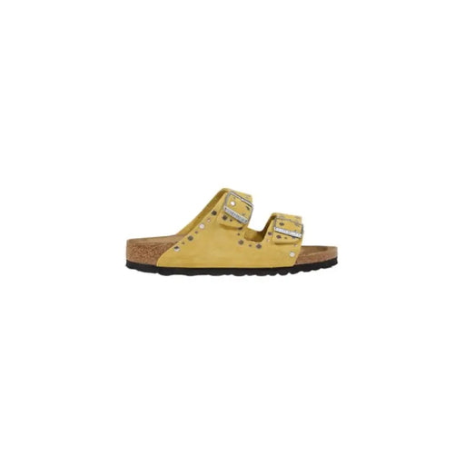 Yellow studded two-strap sandal showcasing stylish and comfortable footwear design