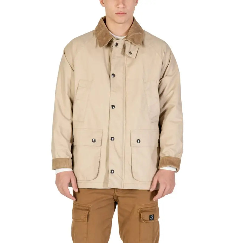5.11 tactical tan canvas field jacket with sherpa lining and cargo pockets.